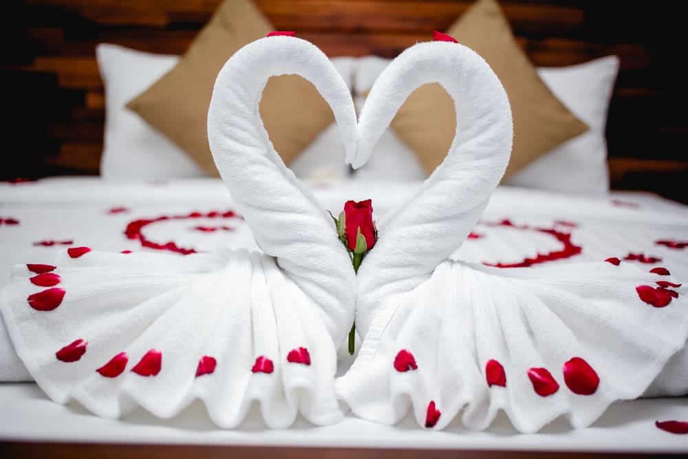 Swan Towels Decorations On Wedding Bed 